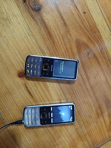 nokia kohne modeller: Nokia 6700 Slide, < 2 GB Memory Capacity, rəng - Gümüşü, Düyməli — 1