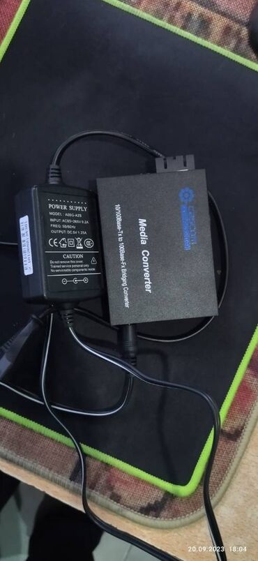 sazz lite modem: Media converter cascom 1 cüt və hərəsinin öz qida bloku üstündə. əla