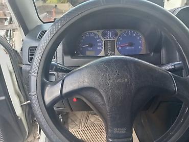 Mitsubishi: Mitsubishi Pajero iO (qısa kuzov, 3 qapı) – ağ rəngdə, şəhər və ofroud — 9