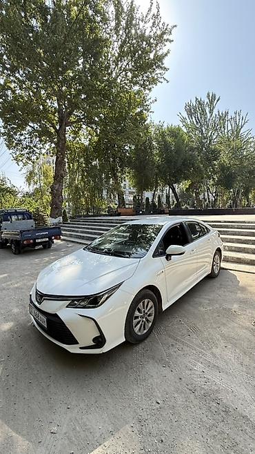 машина гибрид марки: Toyota Corolla: 2019 г., 1.8 л, Вариатор, Гибрид, Седан — 1