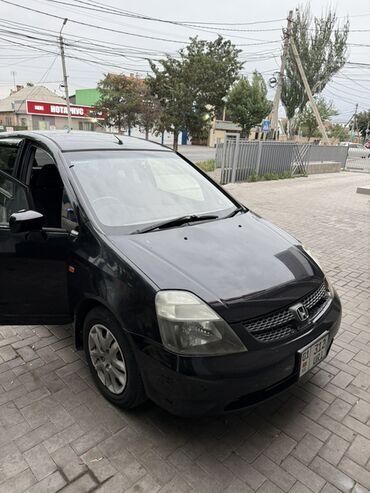 крылья хонда стрим: Автомобиль Honda Stream, черный минивэн. Этот автомобиль идеально