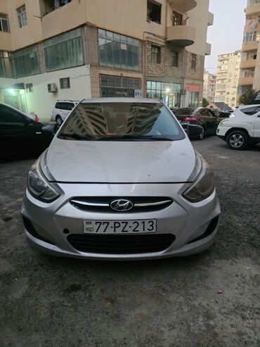 Hyundai Accent: 1.6 л | 2014 г. Седан
