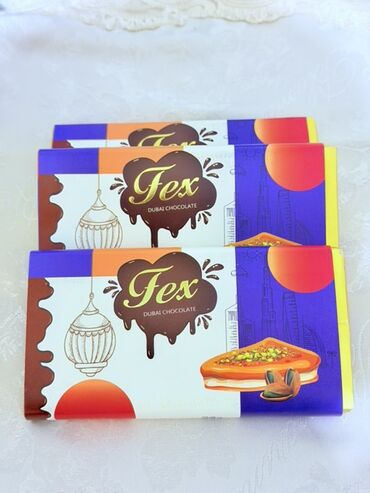 Balıq qulağı: Fex Dubai Chocolate – 230 qramlıq şokolad plitəsi. Tərkib: fıstıq