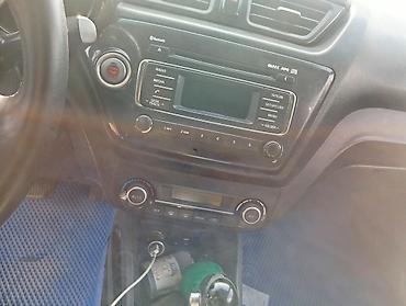 пикап khan: Kia Rio: 2015 г., 1.6 л, Автомат, Газ-бензин (ГБО), Седан — 9