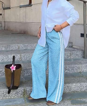 Pantalone: Ženske široke pantalone sa leopard printom - Kroj: široke nogavice — 5