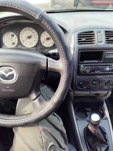 капот мазда: Mazda 323: 2003 г., 1.6 л, Механика, Бензин, Хэтчбэк