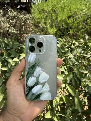 Kabrolar: Müxtəlif iPhone modelləri üçün çiçək naxışlı, şəffaf keys. Bu keys — 37