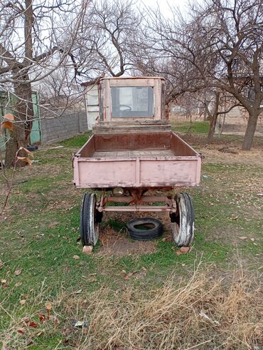 Тракторы МТЗ (Беларус): Трактор с кабиной, задним ведущим мостом и трехточечной навеской — 7