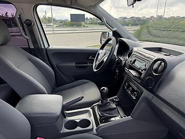 şevralit curuz: Volkswagen Amarok: 2 l | 2013 il Pikap — 2