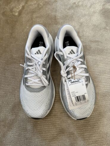 обувь оптом дордой: Беговые кроссовки Adidas Supernova Stride в светло-сером цвете с