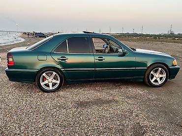 xrom disk: Mercedes-Benz C-Sinfi sedan (W202) – tünd yaşıl rəng, bej dəri salon — 6