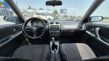 кара электрическая цена: Mazda 323: 2003 г., 1.6 л, Механика, Бензин, Хэтчбэк