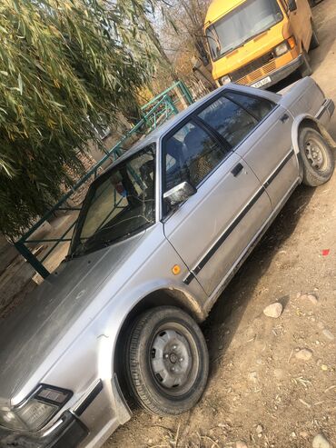 купить двигатель на мотоблок 7 л с: Nissan Bluebird: 1986 г., 2 л, Механика, Бензин, Седан