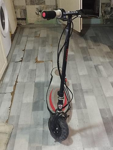 Электротранспорт: Gümüşü və qara rənglərdə olan bu "Razor" elektrikli skuter gəzmək üçün — 4