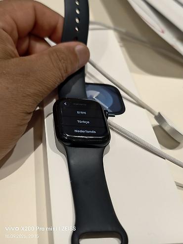 pixel watch 2: Apple Watch (9 серия/ 41 мм), корпус темного цвета, ремешок Sport Band — 1