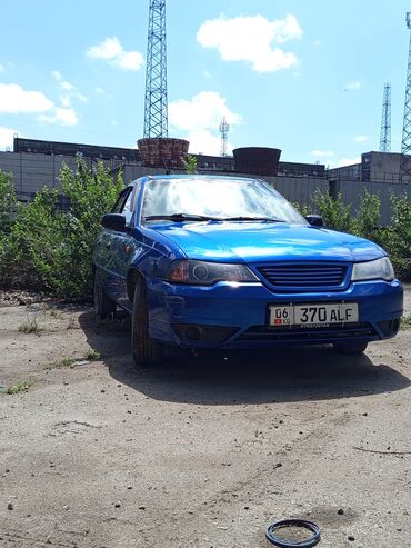 Daewoo: Продаётся синий седан Daewoo Nexia. Этот автомобиль отличается