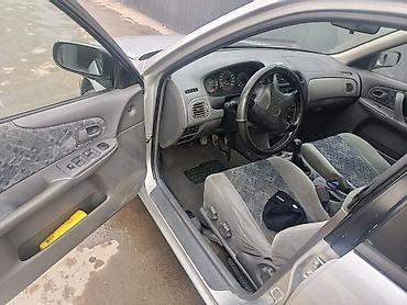 Mazda: Mazda 323: 2000 г., 1.5 л, Ручные, Бензин, Хэтчбэк — 11