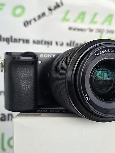 mini dv kamera: Sony Alpha a6000 aynasız fotoaparat + FE 28–70mm f/3.5–5.6 OSS — 7