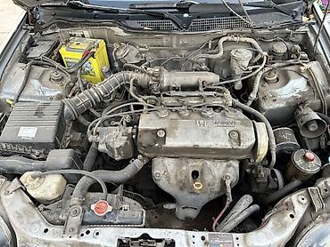 повреждённый автомобиль: Honda Civic: 1997 г., 1.5 л, Механика, Бензин, Седан — 9