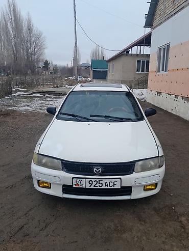 Mazda Familia: 1995 г., Механика, Бензин, Седан