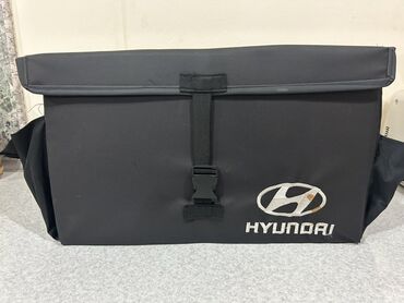 Yağlar və avtokimyəvi maddələr: Hyundai markalı termo çatdırılma çantası - Rəng: qara - Ön hissədə