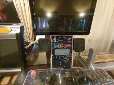 Digər oyun və konsollar: İki nəfərlik arcade oyun aparatı – “ReAction” temalı kabin — 2