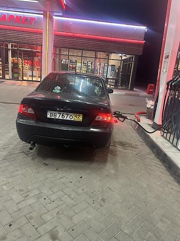 гранде машина: Daewoo Nexia: 2010 г., 1.6 л, Механика, Бензин — 3