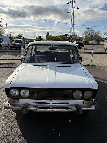 kia rio qapi: VAZ 2106, ağ rəngli sedan ag salon 0 dan yglib surulmuyub sdenkalar — 1