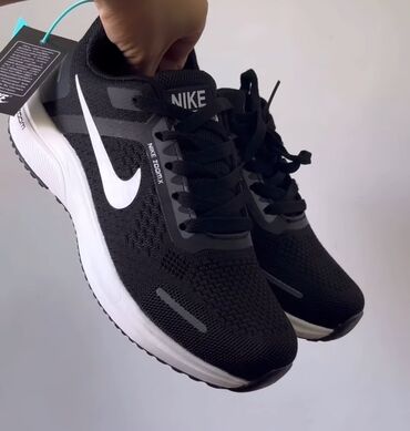 шикарный турецкие вечерние платья для полных: Кроссовки Nike черного цвета с белой подошвой и логотипом. Модель Nike