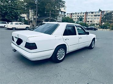 ceşqa kapotu: Mercedes-Benz W124 sedan, ağ rəng Texniki xüsusiyyətlər: - Benzin — 5