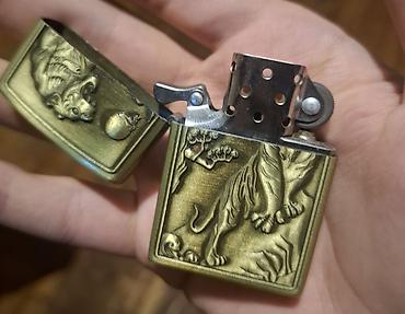 titan maqnit qolbaq: “XingLing Tiger Pələng Relyefli Metal Alışqan — 2