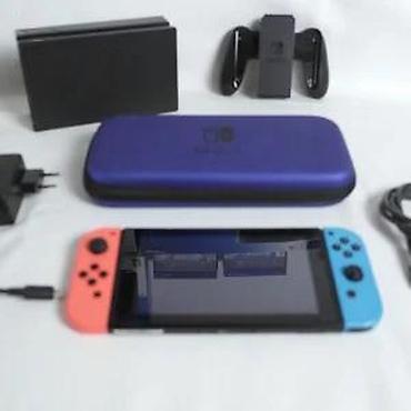 Nintendo Switch: U ponudi je Nintendo Switch. Stanje: lepo očuvana, manji tragovi — 17