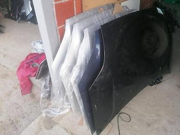 prodaj: HAUBE MASKE ZNAKOVI ZA FORD C-MAX, FIESTA, FOCUS . OD 2002. DO 2007 — 2