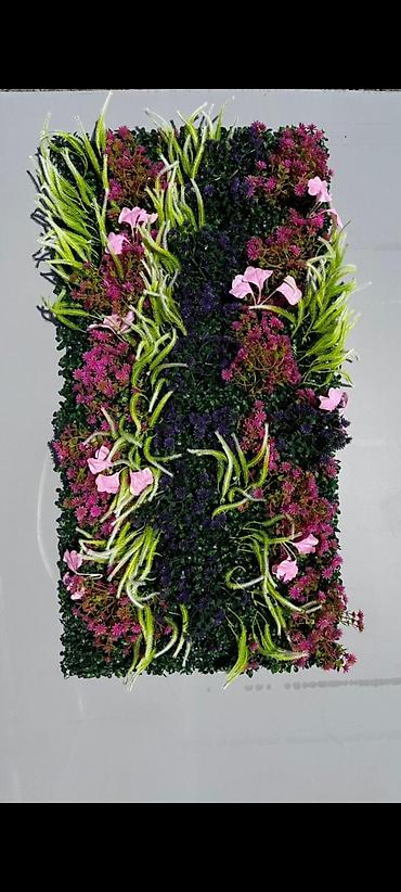 Süni güllər: Müxtəlif süni bitkilərdən ibarət dekorativ divar paneli. Bu panellər — 3