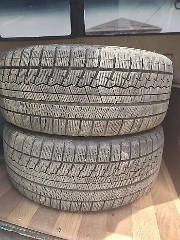 e6 3: Комплект колес: литые диски R18 + зимние шины 245/45 R18 - Диаметр — 2