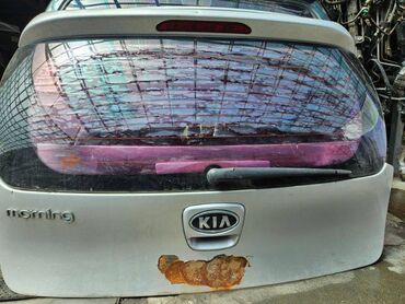 Противотуманные фары: Крышка багажника Kia