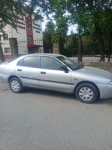 byd e2 2024: Mitsubishi Carisma: 2003 г., 1.8 л, Механика, Бензин, Седан — 1