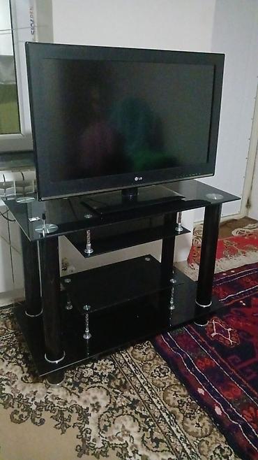 plete: LG düz ekran televizor + qara şüşəli TV stendi Məhsulun təsviri: - — 1
