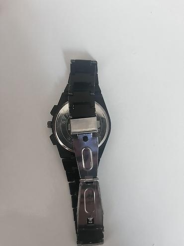 qulaq piercingi: Tissot kişi qol saatı – qara rəng - Brend: TISSOT (loqo və “1853” — 2