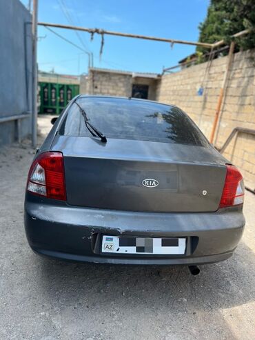 цены на авто: Kia Shuma: 1.5 l | 2004 il Sedan
