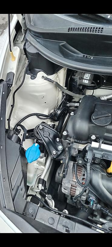 bora: Kia Rio: 1.4 l | 2013 il Sedan — 4