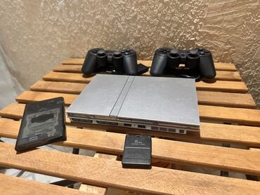 masa ustu konputer: Playstation 2 Slim Silver (gümüşü rəng)+ 200 oyun. Bölgələrə pulsuz