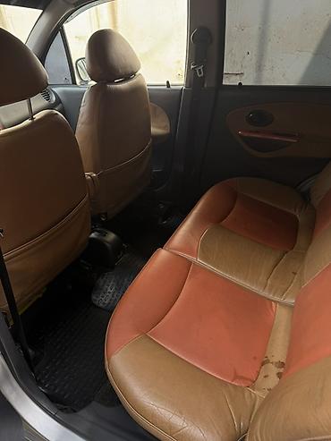 Другие автомобили: Компактный городской хэтчбек серебристого цвета. Характеристики и — 7