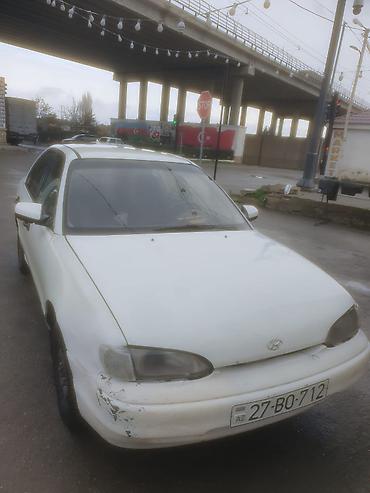 tap az kondisioner: Hyundai Accent: 1.5 l | 1995 il Sedan — 1