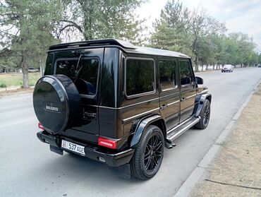 электромобиль neta: Представляем черный внедорожник Brabus G-Wagen G800, припаркованный на