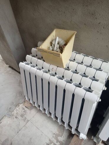 radiyatorlar: İşlənmiş Seksiyalı Radiator Çuqun
