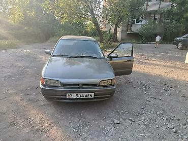 Транспорт: Mazda 323: 1990 г., Седан — 3