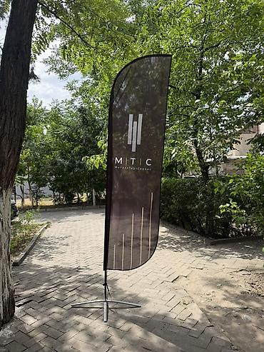 Парусные флаги виндер Описание: - Напольные рекламные флаги с