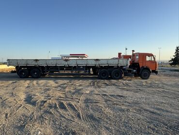 Yük maşınları: KAMAZ yük maşını – narıncı kabinalı, arxada dumper/kuzov tipli daşınma — 5
