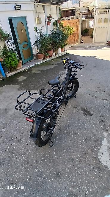 27 5 velosiped: İşlənmiş Elektrik velosipedi 28", sürətlərin sayı: 7, 750 < Vt, Ünvandan götürmə — 8